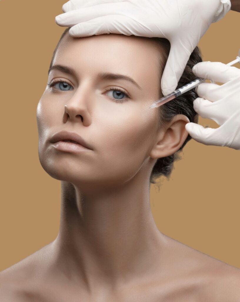 Doctor giving injection to patient in barrow in-Furness